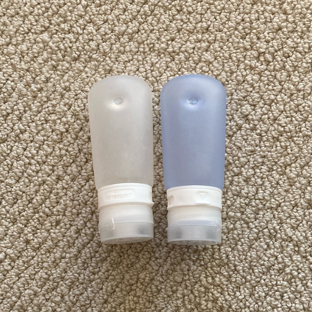 REI Reusable Liquids Containers Silicone Flexible Set Two Travel Airline Clear